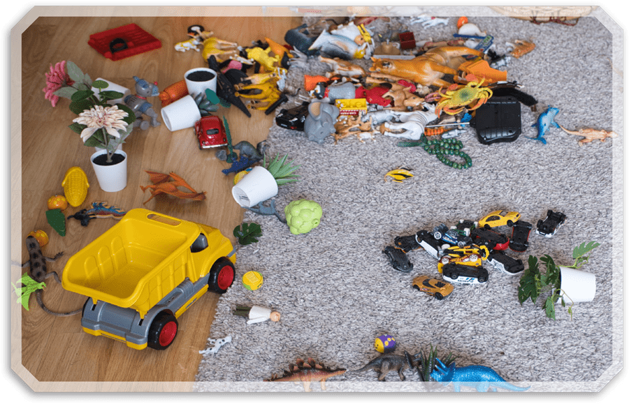 a mess of childrens toys on the floor