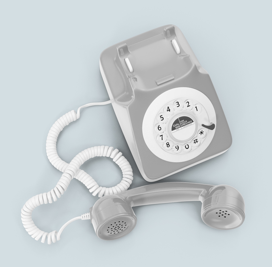 gray dial phone with white cord