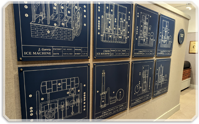 diagrams of inventions on wall
