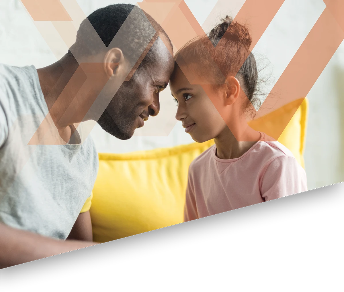father with young daughter touching foreheads