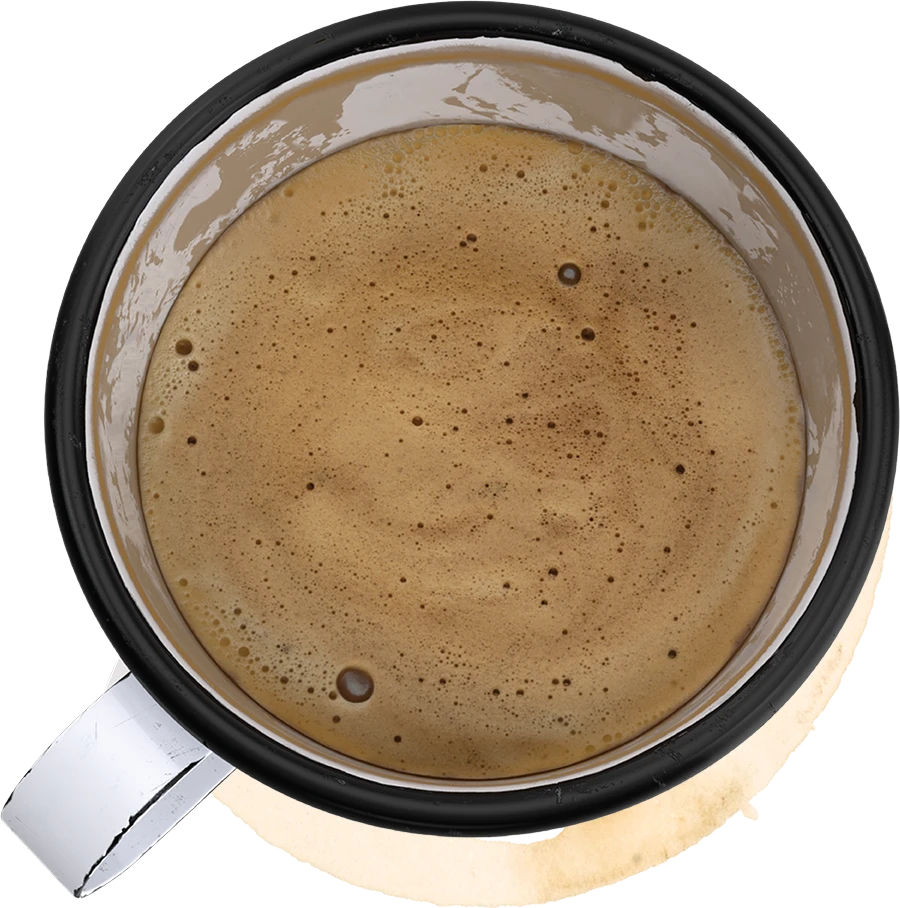 Top-down view of a cup filled with foamy coffee